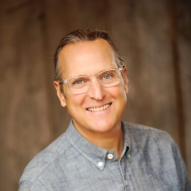 RLH Headshot - head turn square - Ron Hill